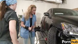 A petite ginger is having lesbian fun in the garage