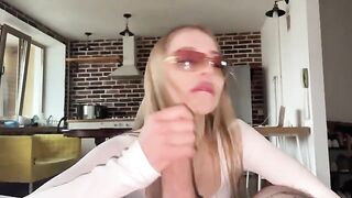 Pretty woman has sex with her guy and gets cum on her glasses