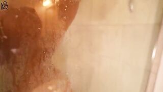 Young beauty has sex with a big dildo in the shower