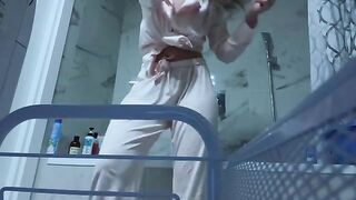 A girl caresses her sweet pussy in the bathroom, no one sees