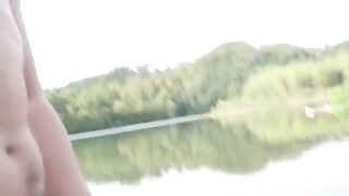 A chick is having fun with a stranger on the nude beach