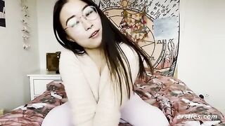 A young and extremely happy Chinese girl masturbates for the camera