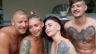 Amateur foursome with two couples having fun together