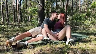 The guy and the girl have a passionate sex on the city park’s bench