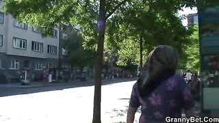A hot granny with freckles and big tits gets fucked by a young stud