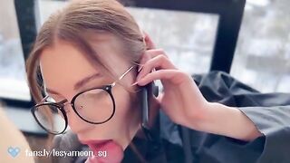 A woman talking on the phone with her husband while her friend is fucking her