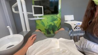 The hot girl is at the dentist for a check-up