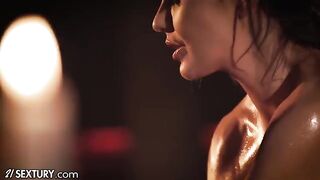 Two gorgeous lesbians have an oily body massage, exploring each other’s bodies with passion
