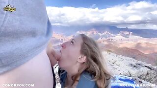 A couple enjoys outdoor sex on a cliff, capturing real amateur passion
