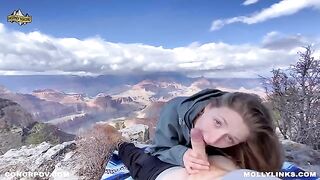 A couple enjoys outdoor sex on a cliff, capturing real amateur passion