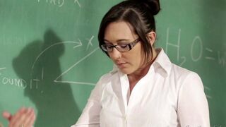A girl is having fun with her teacher at the table