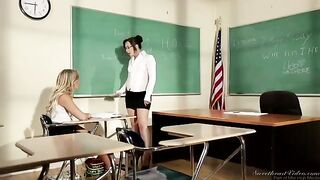 A girl is having fun with her teacher at the table