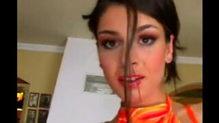 Beautiful woman masturbating on the leather chair