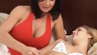 A young girl is having fun with her mature lesbian girlfriend