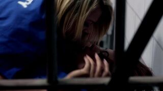 Two girls are having fun without any restrictions in the prison cell