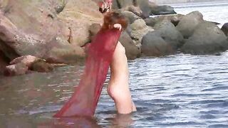 Nudist girl has small boobs and gets them spanked wet