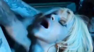 A sexy girl wearing a corset and stockings is touching herself