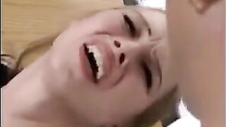 A sexy blonde is having fun with her friends on the table