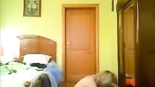 A man peeps at girls in their houses with a camera