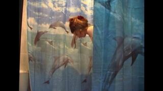 A man shoots his naked wife in the bathroom with a hidden camera