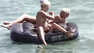 A naked girl is having fun on the mattress