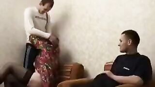 A mature woman fucked by her son's friend