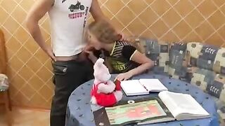 A schoolgirl is fucking instead of doing her lessons