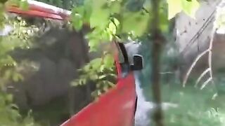 The guy squeezed tits of girl by the car