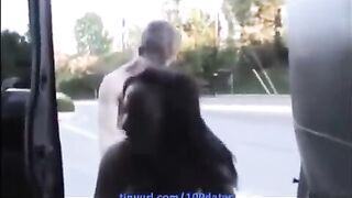A beautiful woman gestured to her boyfriend in a uniform