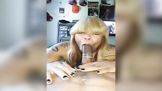 Black beauty in a condom sucked a hard member, showcasing raw passion