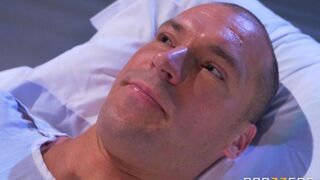 A nurse gave the patient her breast to suck