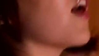 An Asian girl is masturbating her wet pussy with her fingers