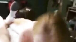 The man took hold of the girl and put her on the bed