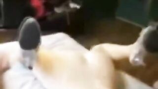 The man took hold of the girl and put her on the bed