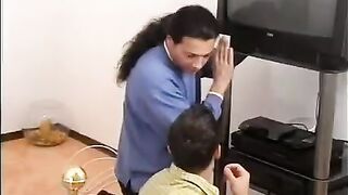 The guy was paid in kind for repairing the TV by two sexy blondies