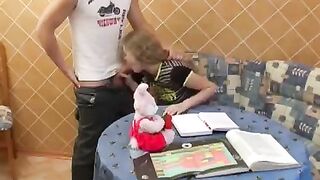 A cute baby is fucking with her classmate in the classroom