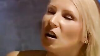 A beautiful girl is being tied up and dominated by multiple men