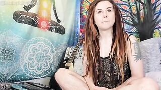 A funny hirsute girl removes her clothes and reaches a climax