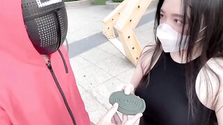 A man was chosen to play the squid game with a hot Asian woman