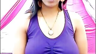Her nipples are standing out, her t-shirt is wet