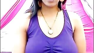 Her nipples are standing out, her t-shirt is wet