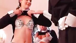 Three girls have sex under the guidance of a nun