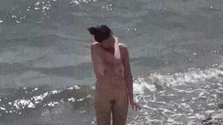 A little naked fun on the beach with a naughty couple