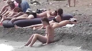 A little naked fun on the beach with a naughty couple