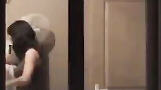 He looks at himself in the mirror and admires his naked body