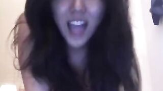 An Asian girl was masturbating using a toy on webcam