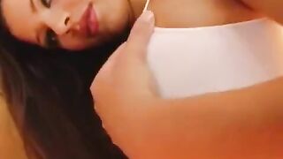A girl masturbates her large, juicy porn vagina with a dildo