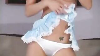A super cute young baby shows off her big boobs in a hot scene