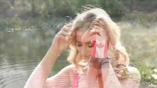Blonde tenderly wanking her pussy by the lake in 4K