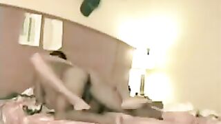 A blonde with natural tits spreads her legs on the bed in this steamy homemade scene